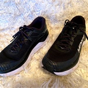 Hoka running shoes size 10 Bondi 7. Mild wear tread otherwise like new condition